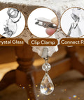 16 Pack Tablecloth Weights With Crystal Teardrop Pendants And Metal Clip Clamps For Glass Table Cover Hangers Perfect For Outdoor Picnics Family Dinners Parties And Elegant Decor, close-up view of crystal and clip clamp on lace tablecloth with background of wooden table legs.