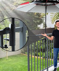 Clamp On Patio Umbrella Holder Clip For Rails No Hassle Adjustable Clamp For Poles Up To One And A Half Inches Fits Balcony Deck Beach Courtyard Outdoor Spaces Black on balcony rail with man standing