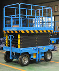 Heavy Duty Electric Scissor Lift Platform Featuring Smooth Hydraulic Action For Mobile Warehouse Cargo Hoisting And Adjustable Height with steel frame.