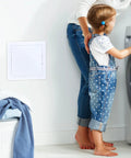 Rock Hard Eight By Eight Inch Drywall Access Panel Two Pack Abs Plastic Wall Cover Plate installed in laundry area.