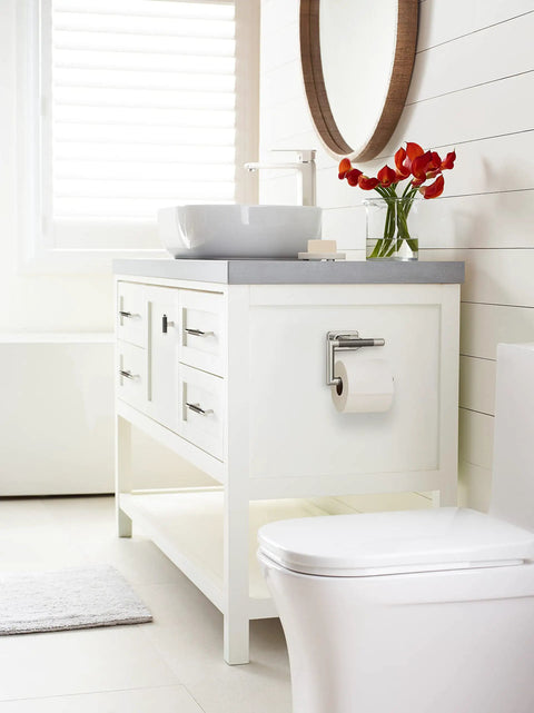 Polished Nickel And Gunmetal Single Post Toilet Paper Holder For Mega Rolls on modern white bathroom vanity.
