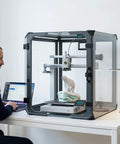 Rock Solid 24 Inch Clear Acrylic 3D Printer Enclosure with digital climate gauge, showcasing 3D printing process in a stylish workspace.