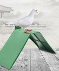 10-Piece Plastic Dove Rest Stands With Anti-Skid And Heat-Resistant Design, Green Pigeon Perch with a Dove Standing on Top