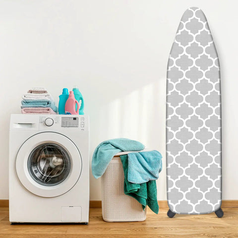 Standard Size 15 X 54 Inches Ironing Board Cover And Pad With Four Layer Extra Thick Padding Resists Scorching And Stains Elastic Edge And Two Straps For A Snug Fit Gray against laundry room wall.