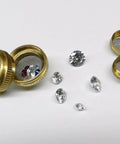 Built Tough Real Deal Ultrasonic Cleaner Baskets Set Of Two with brass frames and stainless steel mesh, containing various jewelry pieces.