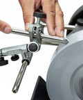 Close-up of SVD-186 R Gouge Jig for Sharpening Woodturning and Woodworking Tools being used on a grinding wheel