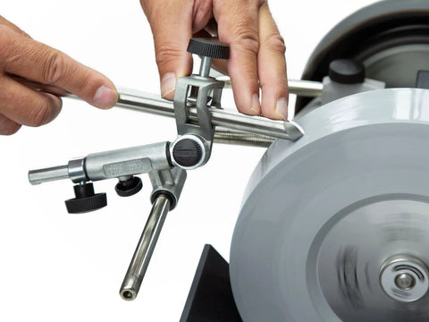 Close-up of SVD-186 R Gouge Jig for Sharpening Woodturning and Woodworking Tools being used on a grinding wheel