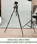 Tripod with Precut Tennis Balls Bulk for Furniture Legs and Chair Feet Covers Gray Floor Protection attached to feet.