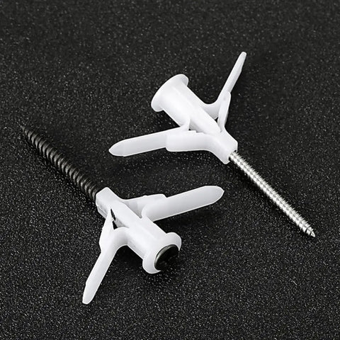 Close-up of butterfly shaped nylon wall plugs from 400 Piece Drywall Anchor Kit With Self Drilling And Butterfly Shaped Nylon Wall Plugs And Expansion Design For Gypsum Board And Wood Heavy Duty DIY Drywall Fasteners For Construction And Electronics