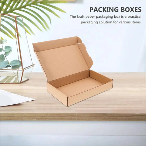Open 10 Pack Paper Mailing Boxes For Shipping Compact Cardboard Mailer Boxes Flat Corrugated Packing For Small Items Moving Supplies Durable Kraft Packaging on a table.