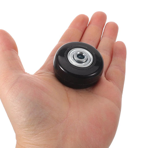 Upgrade Suitcase Game With 4 Sets Luggage Wheels Replacement Kit Silent Ball Bearings Smooth Glide No Whines Easy DIY Fits Most Bags Fixes Broken Casters Zip Terminals Stress Free Sweet Ride Zero Squeaks Keep Rolling Smooth single black luggage wheel with metal bearing in hand