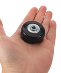 Solid Four Pack Black Luggage Wheel Replacement Kit Precision Roller Bearings Silent Rolling On Terminals And Sidewalks Smooth Glide Durability Suitcase Repair Easy Setup Ensuring Long Dependable Performance Zero Stress Always, black suitcase wheel in hand