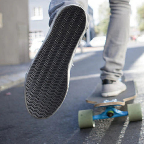 Close-up of shoe with 4 mm thick rubber sole, non slip wave pattern, fitting US Men Size 9.5 and smaller, ideal for DIY repairs.