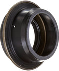 Transfer case output shaft seal, black metal housing with brown inner ring, angled side view.