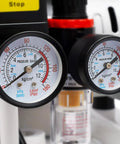 Close-up of pressure gauges on 10 Gallon Oil-Free Air Compressor 1HP Ultra Quiet Vertical Steel Tank measuring PSI.