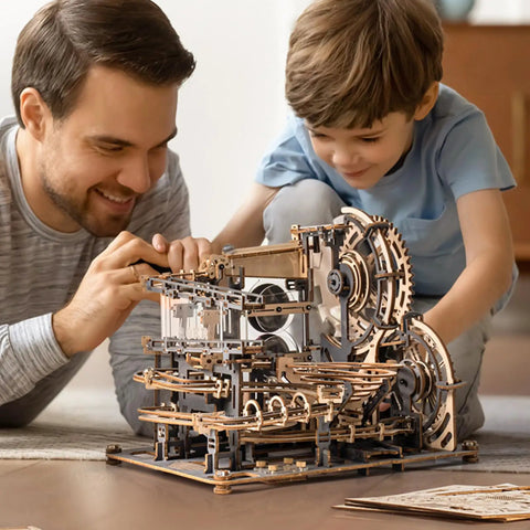 Father and son assembling 3D Wooden Marble Run Puzzle Kit for Adults, Mechanical Marble Track Building Set with 294 pieces