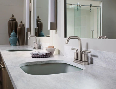 Two-Handle High Arc Bathroom Faucet In Spot Resist Brushed Nickel Finish on modern countertop, ADA Compliant