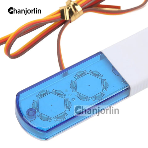 Close-up of One Tenth RC Police Lights LED Flashing Lamp Kit With Nine Modes showing blue LED cover and wiring details.