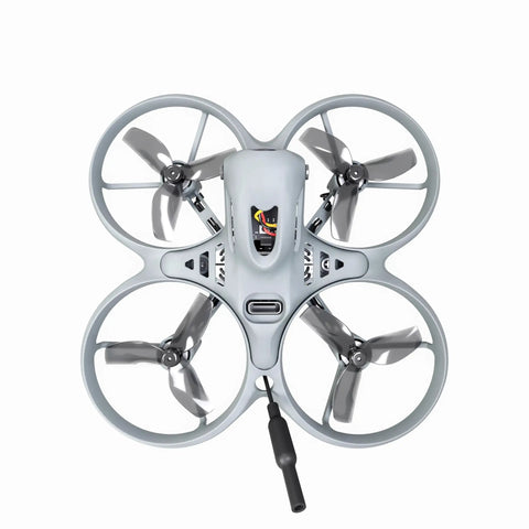 Top view of Lite FPV Drone With Camera RTF Kit Goggles And Remote For Beginners Ready To Fly Set featuring four propellers.