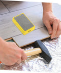 Person using Handheld Diamond Sanding Pads For Ceramic Tiles And Marble Polishing Rock Stone Edge Trimming Block Kit Easy Grip Hand Grinding Pad on tile floor.