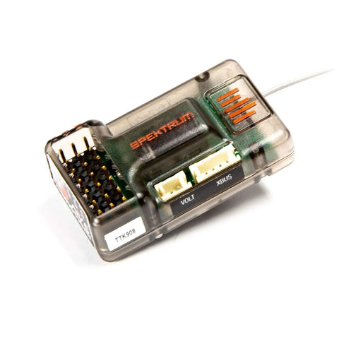 Close-up of Six Channel AVC Telemetry Surface Receiver for RC Cars and Trucks DSMR DSM2 Compatible with connectors visible