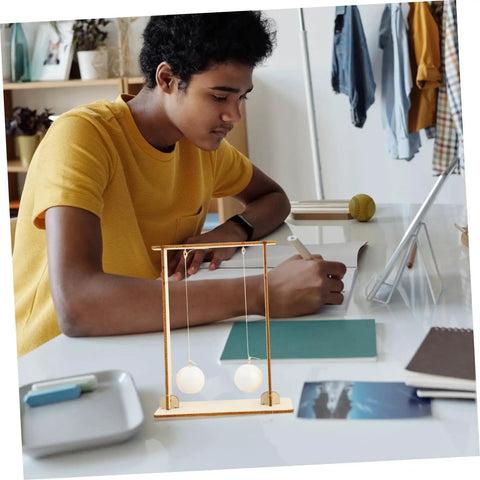 Student using Two Piece Physics Principle Experiment Kit For Students, Safe Lightweight Science Tools, with floating ball demo on desk.