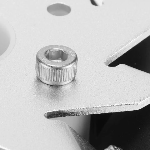 Close-up of knurled aluminum hex-socket mounting nut on a metal chassis plate