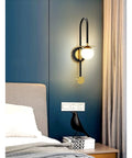 Top Quality Iron LED Wall Sconce With Three Adjustable Colors For Bedrooms And Hallways Glare Free Soft Lighting mounted beside bed.