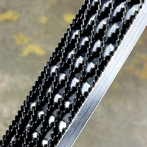 Close-up of Japanese rasp and sanding block quick swap blades non clogging teeth, showcasing detailed coarse rake teeth.