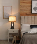 Industrial Farmhouse Table Lamps Duo With Night Light And USB Charging on bedroom nightstand, linen shade glowing