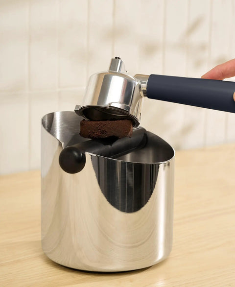 20 Bar Slim Espresso Maker With 1300 Watt Pump And 360 Degree Steam Wand For Silky Microfoam with portafilter and coffee puck.