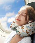 Woman using Cozy On The Go Neck Pillow For Women Multi Functional Travel Pillow For Sleeping And Napping Office And Home Comfort Soft Plush Polyester Colorful Butterfly Flowers Theme on airplane