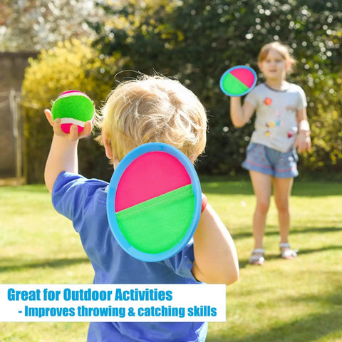 Kids playing with Toss And Catch Ball Set For Kids Outdoor Yard Games Beach Toy With 4 Paddles And 4 Balls Upgraded Durable Version