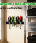 Sturdy 12.6 Inch Wall Mounted Screwdriver And Pliers Holder With 23 Slots Multi Purpose Tool Organizer in garage setting