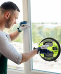 Man using DEWINNER 8-inch glass suction cup lifter on a window; lime-green and black tool
