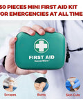 Person holding the Ultra Compact 150 Piece First Aid Kit With Hard Shell, Emergency Medical Kit For Car, Travel, Home, Outdoor, Camping And Hiking, Lightweight Green Case.