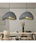 Two Color Design Living Room Suspension Lamps Restaurant Pendant Light Lustre Cafe Chandelier in grey above wooden table.