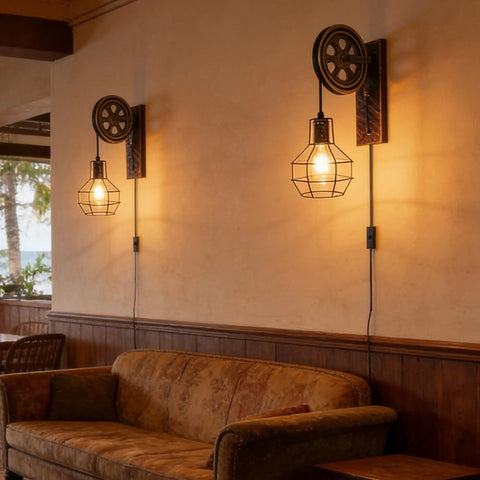 Retro Industrial Wall Sconce Set in Antique Brass Vintage Plug In Lantern Lights 2 Pack Metal Wall Lamps for Bedroom Living Room and Dining Easy Install with 70 Inch Cord and On Off Switch mounted above a sofa in a cozy room.