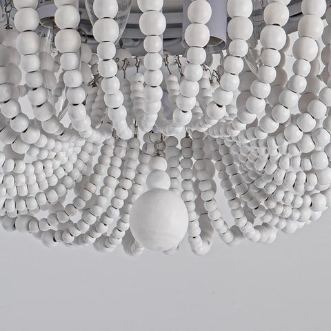 Close-up of white maple beads on Four Light Boho Wood Beaded Ceiling Light Fixture, Rustic Flush Mount Chandelier For Foyer.