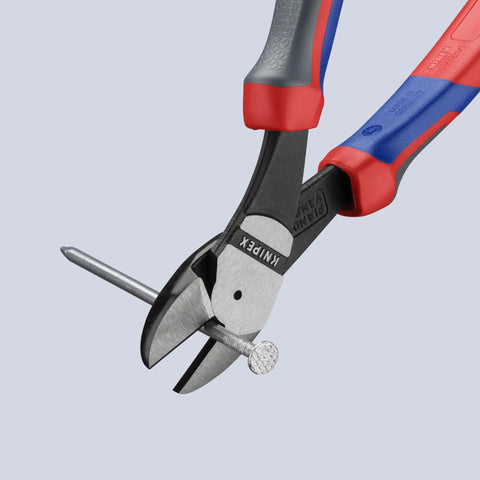 High Leverage Angled Diagonal Cutter 8 Inch With Comfort Grip Handles cutting a nail, showcasing its strength and versatility for rough jobs.