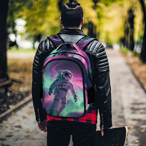 Person wearing Galactic Swirl Spaceman Printed Dope Unisex Backpack Large Capacity Durable Polyester Daypack in a park