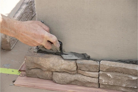 Using Pointing Trowel 5 x 2.5 Inch Philadelphia Pattern One Piece High Carbon Steel Blade DuraSoft Handle on brick wall joint.