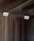 20 Pack Plastic Corner Brackets For Furniture Shelves With 4-Hole Angle Braces installed on wooden cabinet interior for support