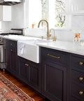 Modern kitchen with marble counter and black cabinets featuring vintage brass zinc alloy cabinet handles set of 6 5.03 inch center to center antique retro pulls with screws for kitchen and bedroom cabinets furniture hardware durable rust resistant finish ideal for dressers wardrobes and vanities.