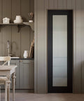 24x80 Black Frosted Glass Interior Door Slab With Dope Look And Solid Shaker Finish, pre built sliding barn style panel installed in kitchen