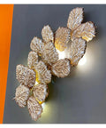 Top Shelf Modern Wall Sconce With Chill Ambient Glow For Living Room And Bedroom Background Decoration Built Like A Tank Perfect For TVs And Snug Spaces, featuring a decorative leaf design.