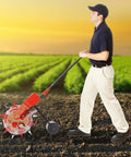 Man using Walk Behind Seed Planter With Six Nozzles Manual Row Crop Seeder Upgrade Version in a field