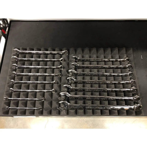 Trap Mat Universal Tool Drawer Liners Four Piece Low Profile Mats That Fit Two Inch And Up Segmented Sixteen By Twenty Two Inch Solvent Resistant Foam Keeps Your Gear Snug And Your Tools In Place with wrenches in foam holder in drawer.