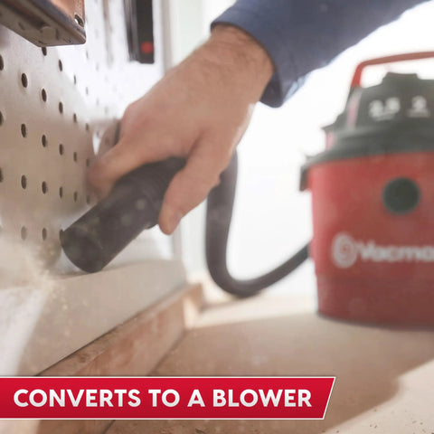 Close-up of hand using 2.5 gallon wet dry shop vac attachment, demonstrating conversion to blower function.