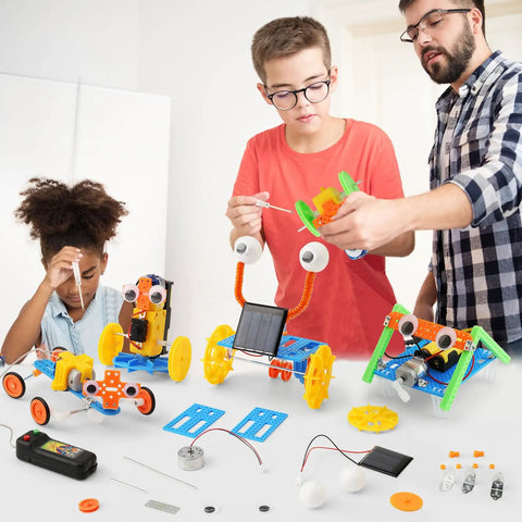 Children assembling Five Robot STEM Kit For Kids Ages Seven and Up With Rope Climbing Robot Solar Car Gecko Gear Robot